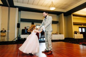 Father dancing with his little girl during Kwataqnuk Resort wedding reception