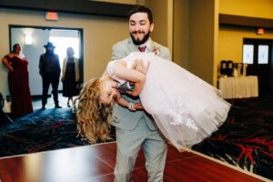 Father daughter dance in ballroom at Kwataqnuk Resort