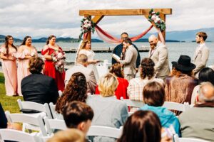 Bride and groom vows at lakeside wedding reception in Western Montana