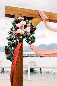 Wedding arch with Flathead Lake in background