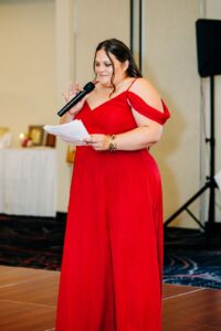 Maid of honor giving wedding reception speech