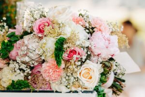 Close up of bridal bouquet with white and pink flowers