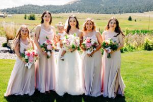 Bride with bridesmaids and flower girl