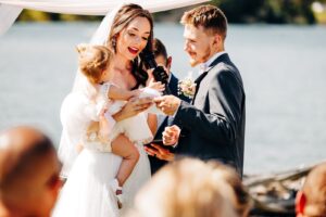 Bride and groom exchanging vows at Flathead Lake Forevers wedding ceremony