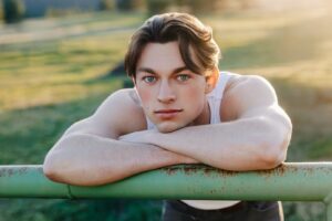 Professional outdoor headshot of Missoula man at Blue Mountain Trailhead
