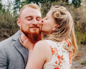 Spring engagement photo Missoula couple kissing