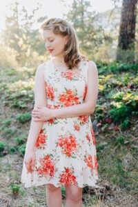 Vintage style portrait engaged Missoula woman in floral dress