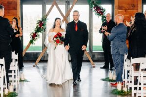 Bride and groom ceremony exit at Snowline Acres in Kalispell, MT