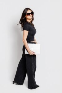 Brand portrait Missoula Drybar manager walking with laptop