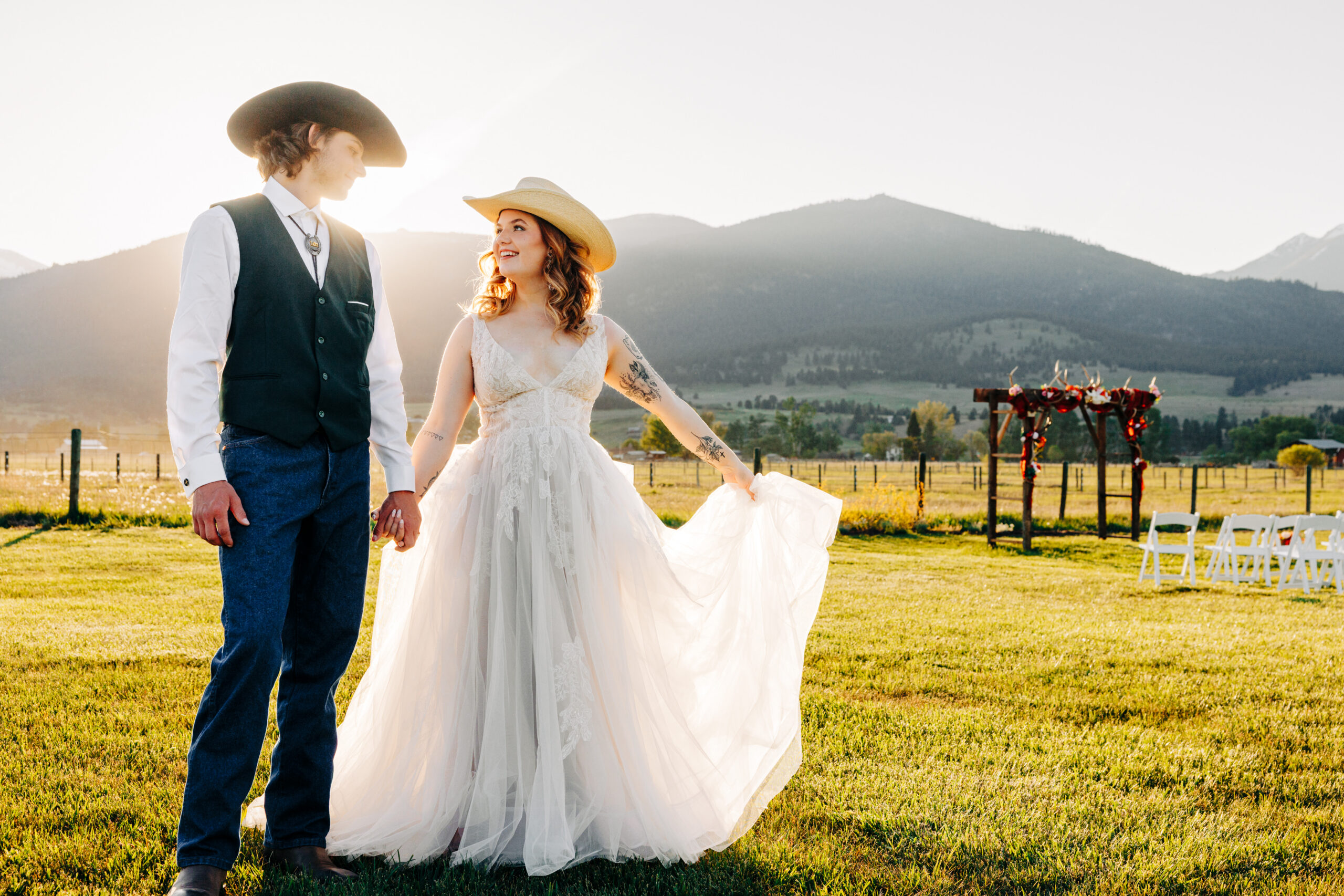 Golden hour portrait of bride and groom at McVey Homestead in Victor, MT