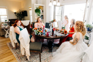 Bridal party getting ready in dining room of McVey Homestead farmhouse in Victor, MT