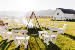First pit and white back on lawn at McVey Homestead wedding venue